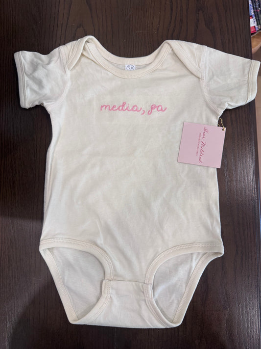 Media baby onesie